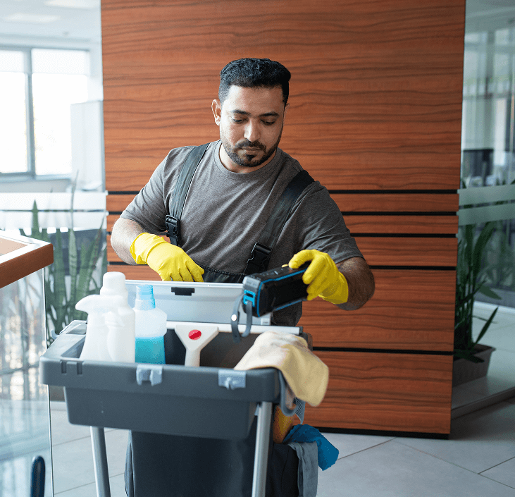 medium shot man walking with cleaning cart 1 (1)